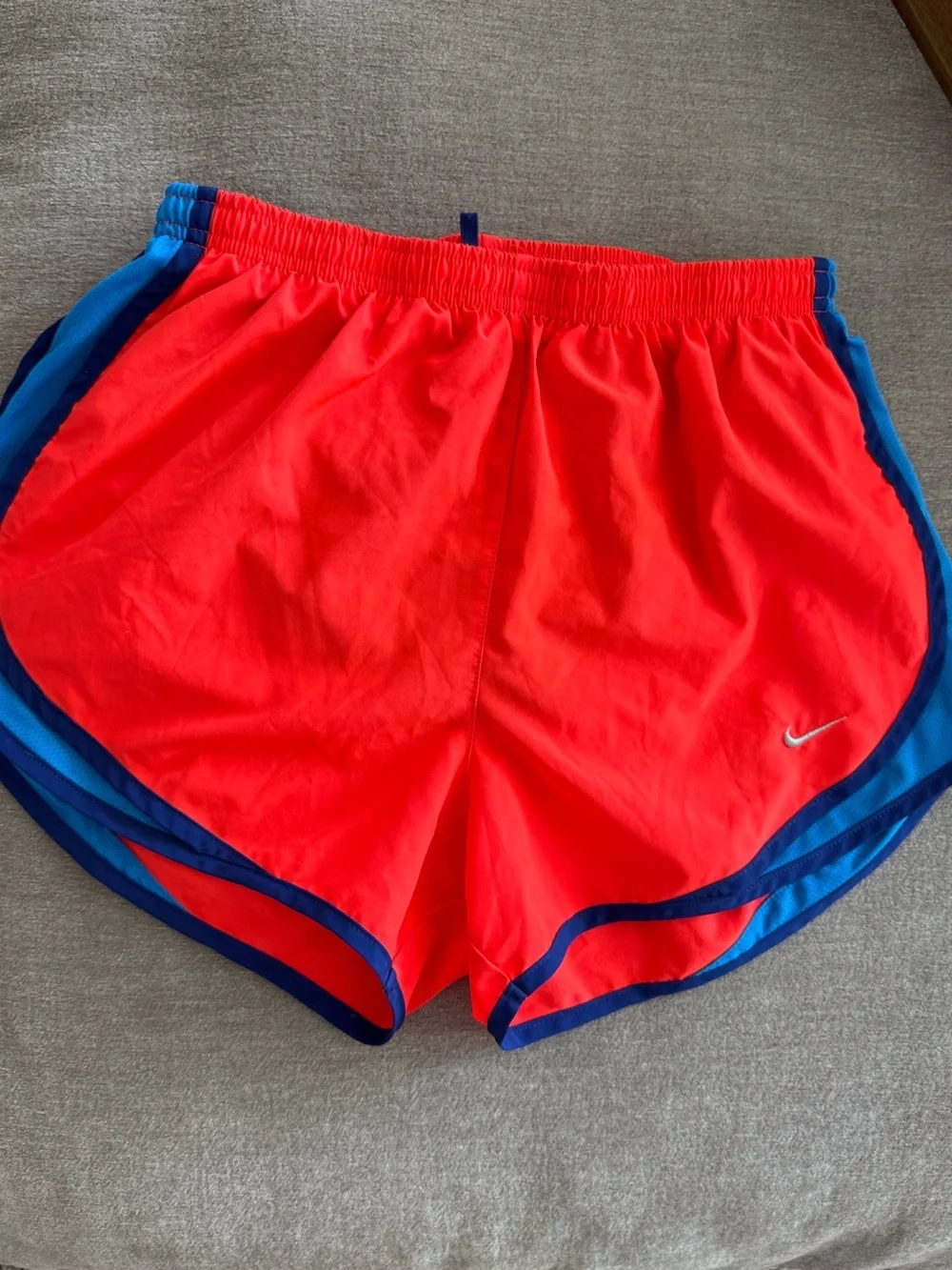 Nike Women's Coral Red Athletic Shorts with Blue Trim